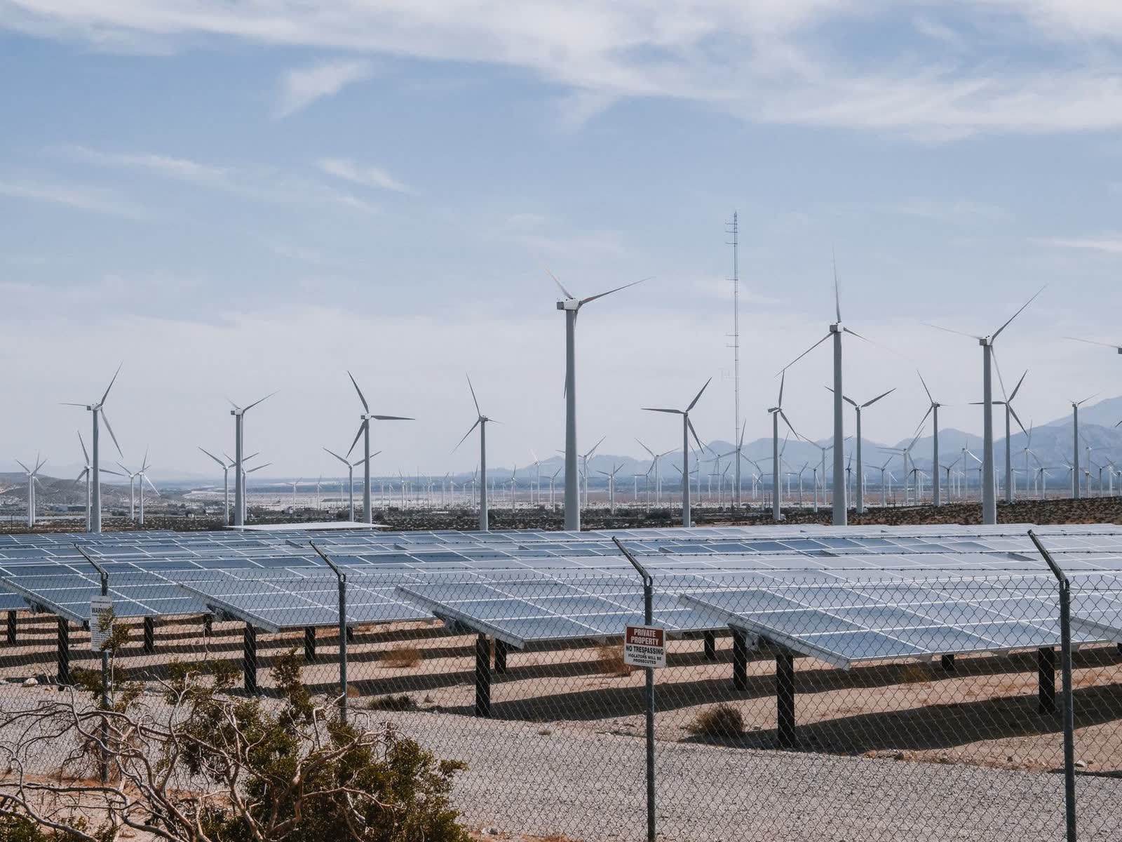 Dust accumulated across a solar array in an arid landscape